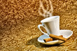 cup of steaming coffee on deep golden brown