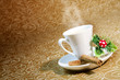 cup of steaming coffee with Christmas motifs
