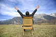 man on the chair in the nature