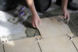 Closeup of tiles installation on the floor. Closeup of tiles installation on the floor.