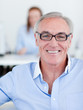 Senior manager wearing glasses Senior manager wearing glasses