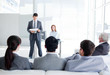 A diverse business people at a conference A diverse business people at a conference