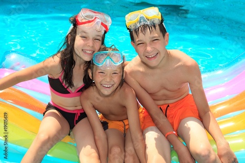 Photo: Smiling children in pool Smiling children in pool
