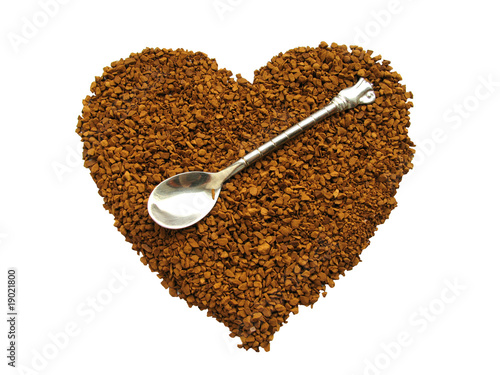 Photo: Natural coffee in the form of heart. Natural coffee in the form of heart.