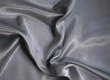 Smooth elegant silvery grey silk as background Smooth elegant silvery grey silk as background