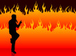 singer performing on fire background