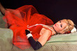 woman laying down in red