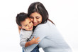 Mother hugging toddler son