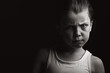 Low Key Shot of a Child with Attitude