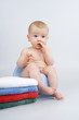 Little girl preparation for bath.