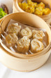Dumplings in bamboo steamer
