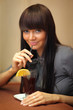 Woman drinking mulled wine.