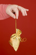 small gold bag in children hand