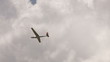 HD Plane flying in sky with clouds
