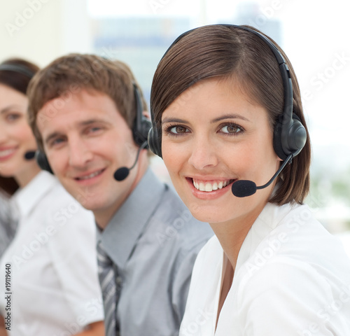 Photo: Young businesswoman smiling at the camera Young businesswoman smiling at the camera