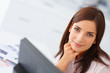 Portrait of a sweet young business woman during work