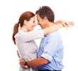 A cute couple hugging eachother over white background