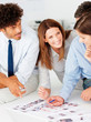 Magazine editors working on new photographs