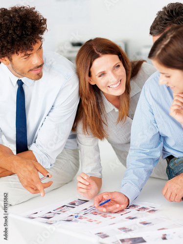 Photo: Magazine editors working on new photographs Magazine editors working on new photographs