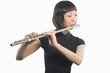 Young Korean woman playing flute