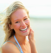 Photo: Portrait of a cute young smiling, outdoors Portrait of a cute young smiling, outdoors