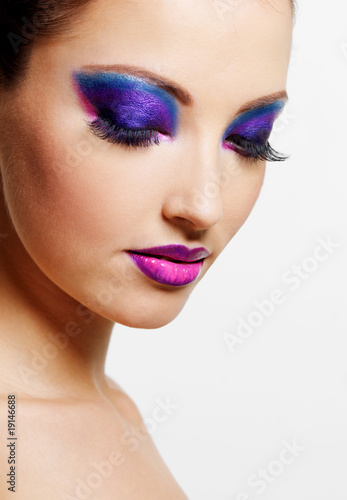 Photo: female face with bright beauty fashion make-up female face with bright beauty fashion make-up