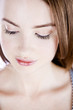 A Close Up Of A Young Woman's Face, Looking Down