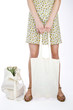 A Young Woman With Shopping Bags