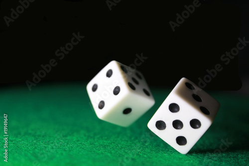 Photo: Dice over green felt Dice over green felt
