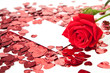 Red rose and blank invitation card