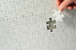 Puzzle mit Hand