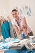 Female fashion designer working at studio Female fashion designer working at studio