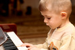 Boy plays piano