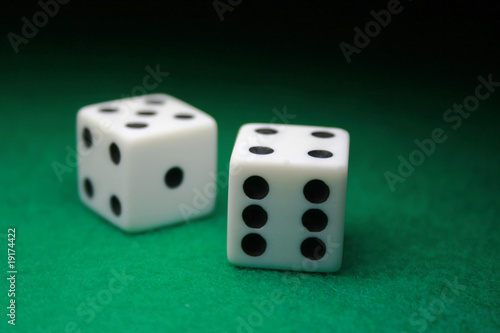 Photo: Pair of Dice over green Pair of Dice over green