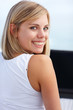 Portrait of a happy cute woman using a laptop