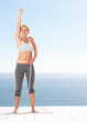Full length of a happy female on success of a weight loss
