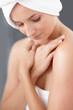 Shy woman at the bath , hands crossed at chest