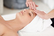 Young woman relaxing during a massage at the spa