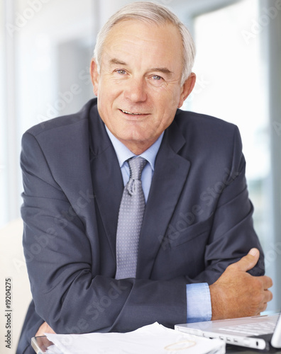 Foto: Portrait of a successful senior business man Portrait of a successful senior business man