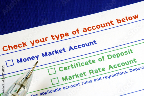 Photo: Select your bank account in the deposit slip isolated on blue Select your bank account in the deposit slip isolated on blue