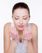 young attractive woman washing her face