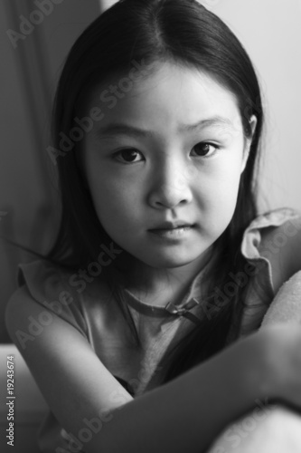 Photo: black and white portrait of an eight-year old asian girl black and white portrait of an eight-year old asian girl