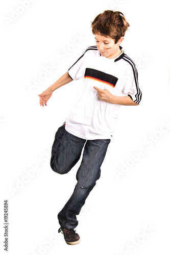 Photo: Child is playing soccer Child is playing soccer