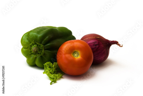 Photo: tomato, green pepper, red onion and a piece of lettuce tomato, green pepper, red onion and a piece of lettuce