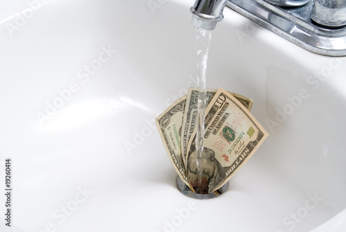 Photo: Money Down the Drain Money Down the Drain