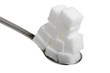 Häufchen Zuckerwürfel auf einem Löffel
