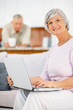Senior woman using a laptop at home Senior woman using a laptop at home