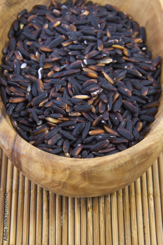 Photo: Black Rice in a wooden bowl. Black Rice in a wooden bowl.