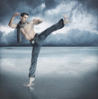 Taekwondo fighter training in the nature