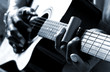 African American man playing guitar